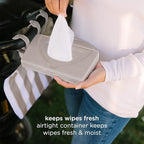 Side profile of Ubbi travel wipes dispenser in taupe color