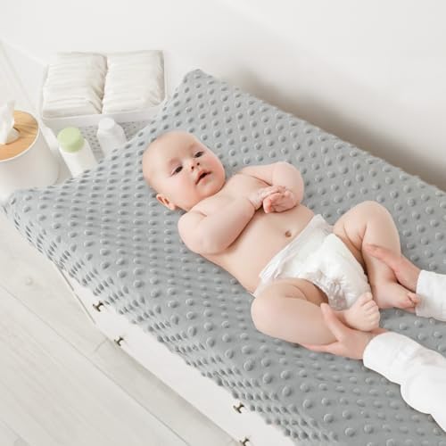 Soft premium baby changing table covers displayed in a modern nursery setup
