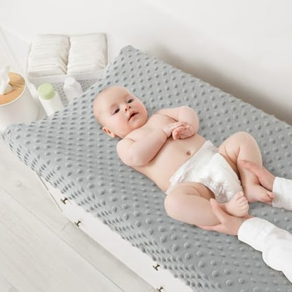 Soft premium baby changing table covers displayed in a modern nursery setup
