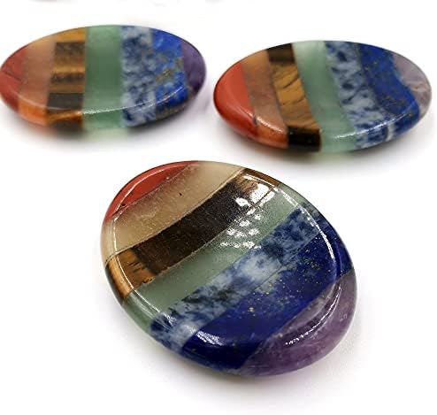 Portable chakra balancing crystal tool for energy healing and grounding.