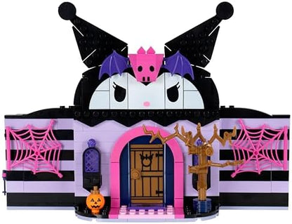 Detailed shot of the spooky exterior components including the spider web and eerie tree brick pieces.