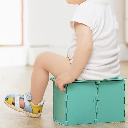 Green portable toddler toilet with leak-proof bag attached