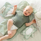 Tiny Twinkle portable diaper mat showing the integrated smart wipes pocket for easy access.
