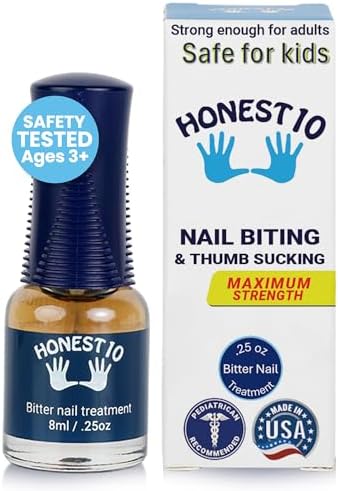 Close up of Honest10 bitter nail polish applicator brush and clear formula.