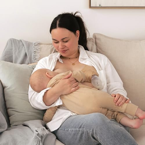Haakaa silicone breastfeeding pump with blush storage cap attached