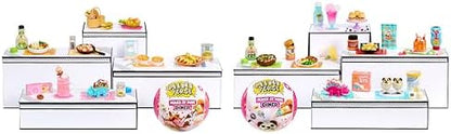 Finished resin replica desserts displayed on the included miniature plastic tables