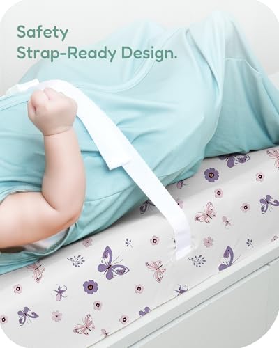 TotChill unisex changing pad sheets highlighting the integrated side openings for baby safety harness straps.