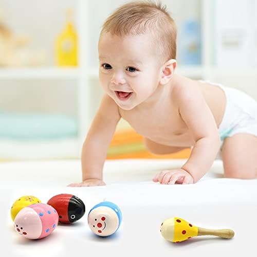 Toddler hands holding the premium imported wooden musical percussion toys safely.
