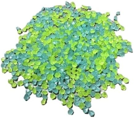 Sfc Inc rainbow glow pebbles inside an aquarium
