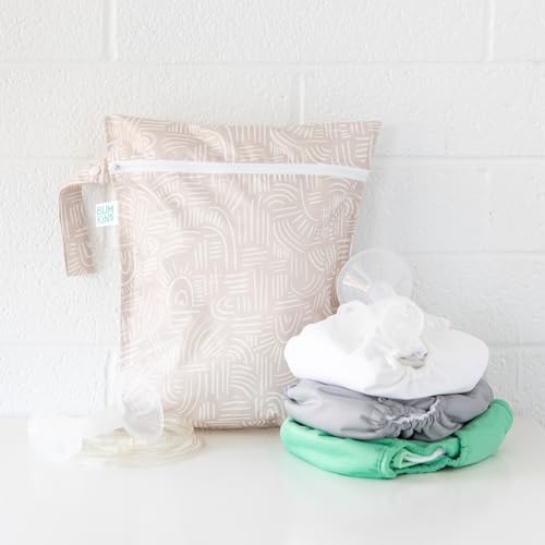 Bumkins waterproof storage bags filled with baby cloth diapers
