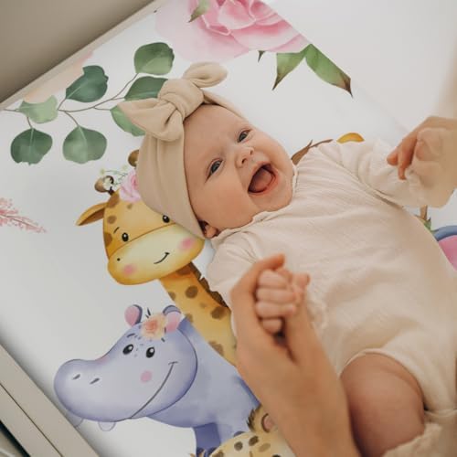 Baby changing pad cover styled on nursery changing table