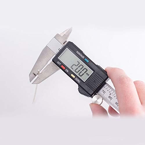 Two six inch twelve gauge ninety nine point ninety nine percent pure silver electrodes showing thickness.