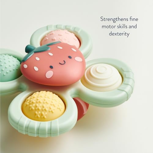 Side angle of the Itzy Ritzy Pop And Whirl strawberry spinner toy showing its compact profile and premium plastic finish.
