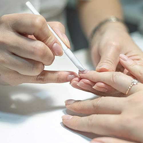 PAGOW pure white under nail pencils set arranged neatly on a clean vanity background.