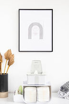 Ubbi Tabletop Diaper Caddy in a styled nursery setting