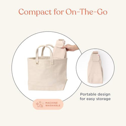Close up view of the cushioned shoulder strap on the Ergobaby Upsie sling.