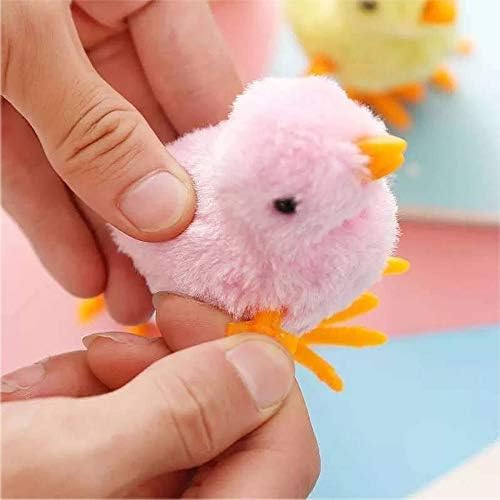 Furry white and pink windup bunny toys designed for toddler hand grip development