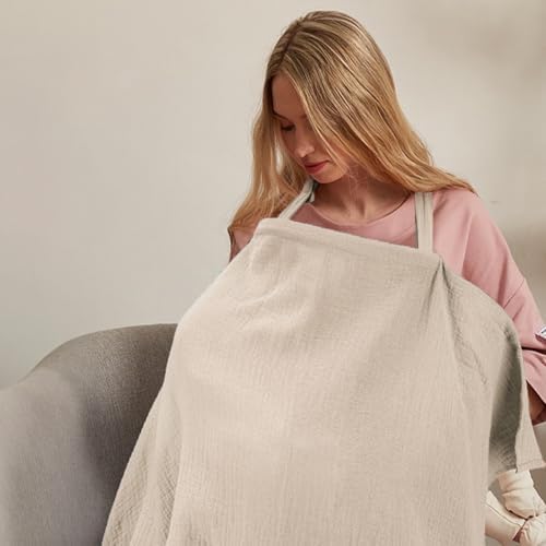 Mother using Comfy Cubs muslin nursing cover