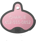 YIP Smart Tag custom engraved dog tracking device inside black silicone sleeve