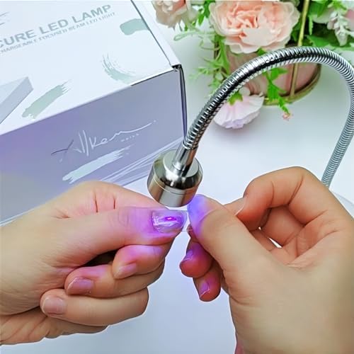 Allkem nail lamp showing the weighted base and switch