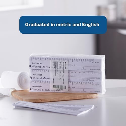 Non sterile paper measuring guide demonstrating dual centimeter and inch markings