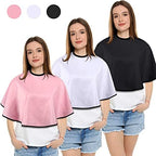 Three pieces of shorty salon smocks with adjustable neck buckles laid out flat.