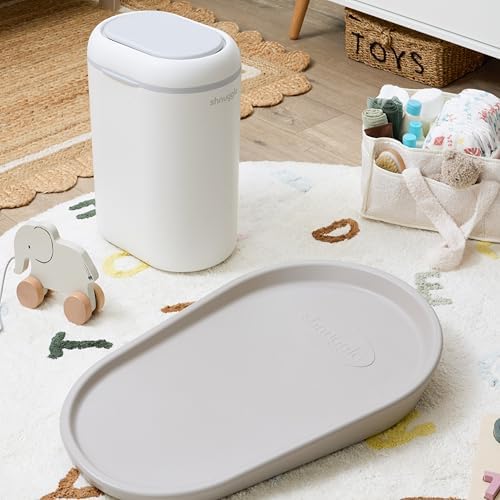 One-handed drop and go operation of Shnuggle nursery bin