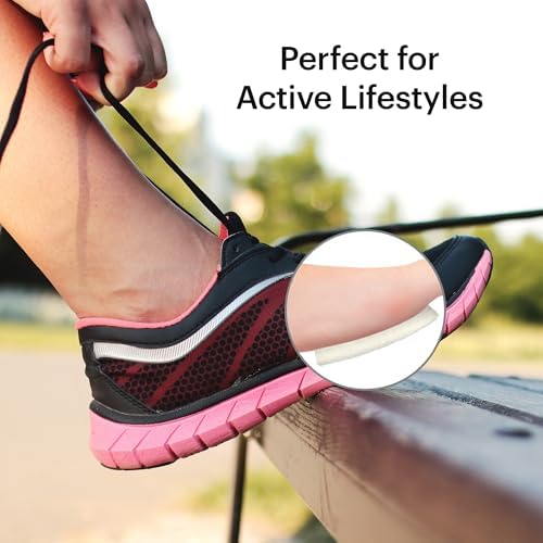Moon Health foot pads applied to the interior of a woman's high heel shoe.