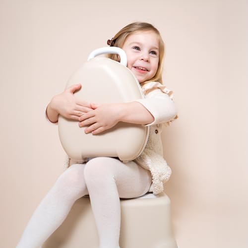 Toddler using My Carry Potty for travel training