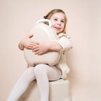 Toddler using My Carry Potty for travel training