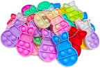 Complete bulk set of twenty four pieces holiday egg fillers laid out clearly for party favor planning
