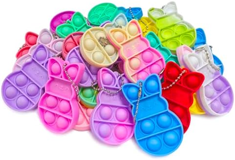 Complete bulk set of twenty four pieces holiday egg fillers laid out clearly for party favor planning