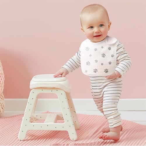 Baby wearing soft muslin bandana style bib