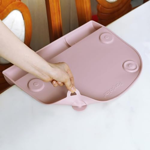 PandaEar baby self feeding silicone mat attached to restaurant table