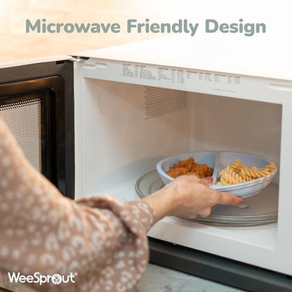 Toddler eating from WeeSprout divided silicone plate