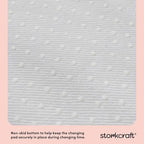 Storkcraft Nest 4-Sided Contoured Baby Changing Pad on dresser topper