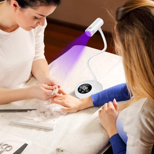 Flexible white gooseneck lamp bending over hands for easy flash curing of gel extensions.