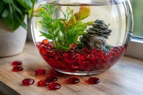 Red glass pebbles displayed as wedding table scatter