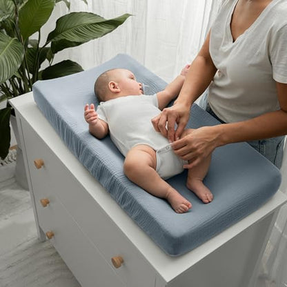 Secure elastic edging detail of the Comfy Cubs universal baby changing pad mattress cover.