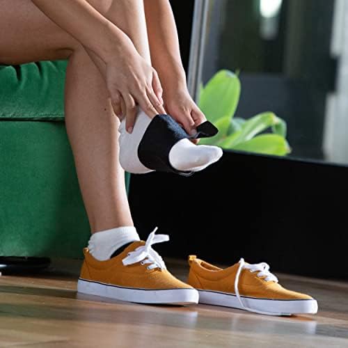 Copper Fit orthotic support band worn with sneakers to demonstrate slim fit design.