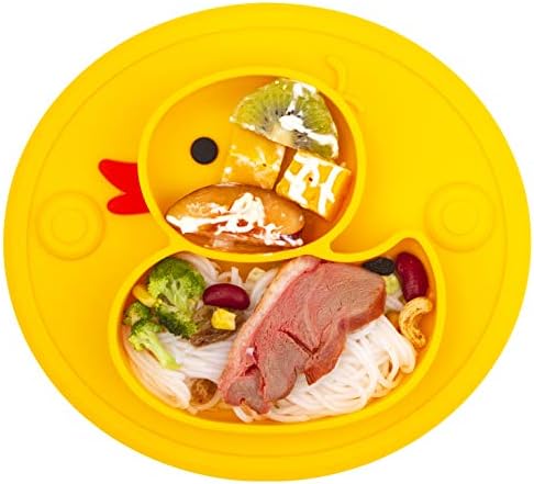 Yellow duck shaped baby suction plate sticking to a high chair tray