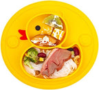 Yellow duck shaped baby suction plate sticking to a high chair tray