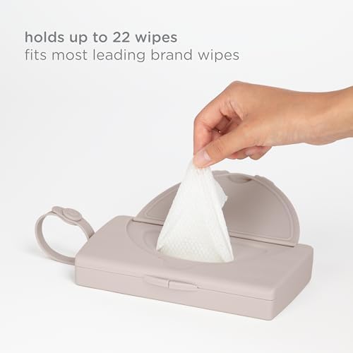 Ubbi baby wipes dispenser showing how to attach silicone strap to bag