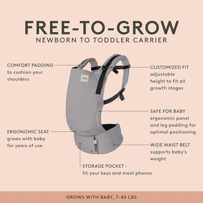 Tula ergonomic baby carrier in black showing the adjustable waistband and padded shoulder straps.