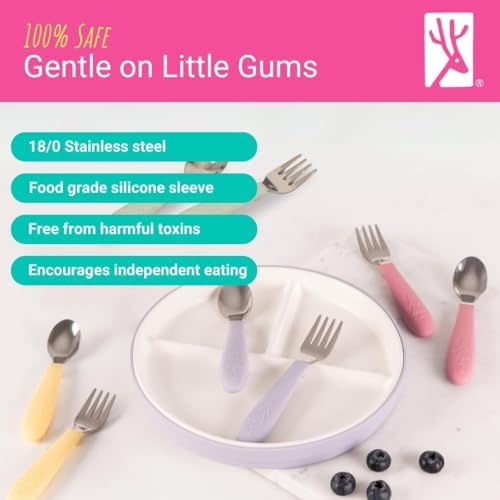 Toddler using Elk and Friends ergonomic silicone handled fork