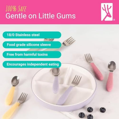 Toddler using Elk and Friends ergonomic silicone handled fork