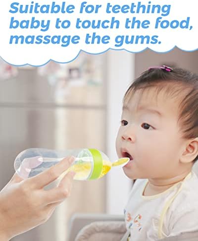 Portable baby food dispensing bottle spoon being held to demonstrate one-handed feeding convenience.