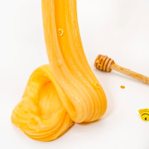 Close up view of the thick and glossy honey themed slime showing texture details