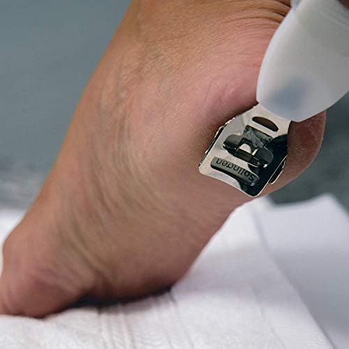 Tweezerman dual action foot file showing the slide and lock safety mechanism.