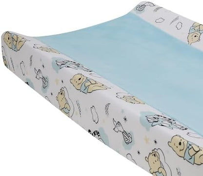Lambs and Ivy blue minky diaper changing mat topper showing the integrated safety strap buttonholes.
